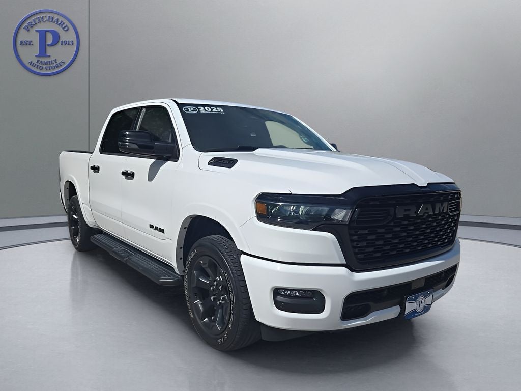 2025 RAM 1500 Big Horn/Lone Star in Bright White Clearcoat — front three-quarter view