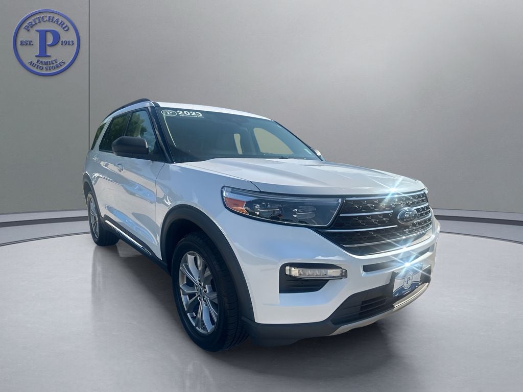2023 Ford Explorer XLT in White Metallic — front three-quarter view